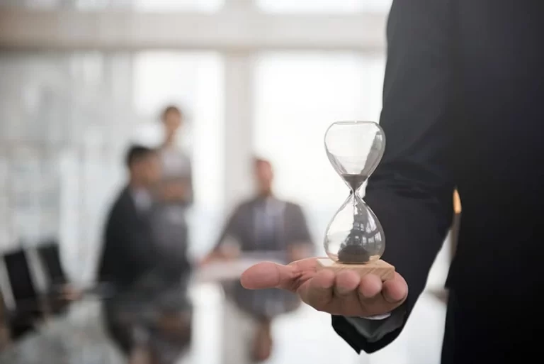 businessman-holding-hour-glass-signifies-importance-being-time (1)